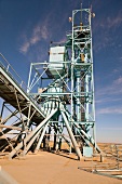 Low angle view of parrish granary machine on Highway 2, Saskatchewan, Canada