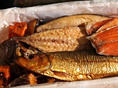 Close-up of fresh fish on paper, Spiekeroog, Lower Saxony