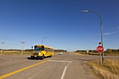 School bus crossing Highway 15 and 35, Saskatchewan, Canada