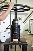 Close-up of manufacturing of screw press soap production