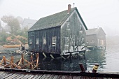 View of wooden house and fog in Lunenburg, Nova Scotia, Canada