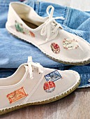 Stamps stuck on white fabric shoes