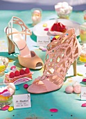 Pink peep toe and cut out sandals with colourful decorations