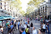 People shopping at La Rambla Las Ramblas shopping street in Barcelona, Spain