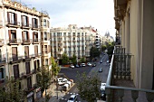 View of Sagrada Familia facade and street through building in Barceloan, Spain 