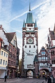 View of buildings and St. Martin's Gate of Freiburg, Germany