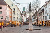 People walking on Kaiser-Josef street in Freiburg, Germany