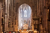 Figures of apostles to praying in Munster of Freiburg, Germany