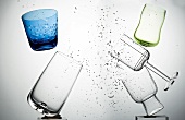 Various glasses in air with droplets of water
