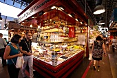 People shopping food form market stalls in Barcelona, Spain