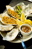 Fresh oysters with lemon on plate, Belfast, Northern Ireland