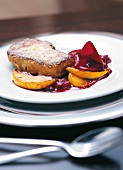 Close-up of French toast with caramelized apples and calvados quince on plate