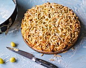 Gooseberry cake topped with slivered almonds