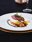 Saddle of venison with celery puree and truffled chestnuts