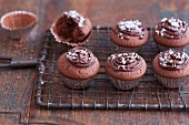 Chocolate cupcakes made with espresso and coconut in metal baking tins