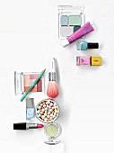 Pastel coloured cosmetic products
