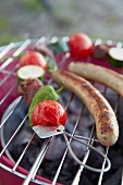 Vegetable and skewers on a barbecue