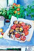Oven-baked summer vegetables on baking paper