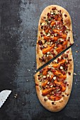 Focaccia with apricots, bacon and hazelnuts (seen from above)