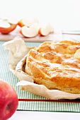 An apple cake on baking paper