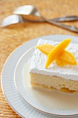 Piece of Tres Leche Cake with Mango