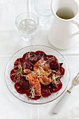 Beetroot salad with smoked salmon, beansprouts and capers