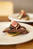 Duck breast with figs on crostini