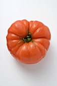 Water drops on a beefsteak tomato (seen from above)