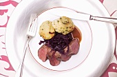 Venison medallions with red cabbage and napkin dumplings for Christmas dinner