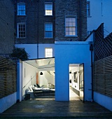 English town house with modern, renovated ground floor and view of illuminated living room