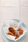 Vegetable cakes with bean sprouts and a yoghurt and lemon dip