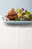 Mushroom and potato cakes with a wild herb salad