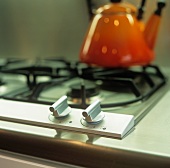 A temperature regulator on a gas hob