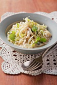 Noodles with pointed cabbage in a creamy sauce