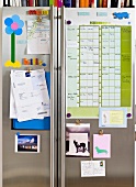 Magnetic message board with calendar, postcards etc.