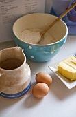 Ingredients for pastry: eggs, flour and butter