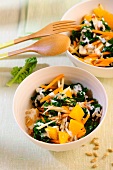 Green cabbage salad with carrots, oranges and sunflower seeds