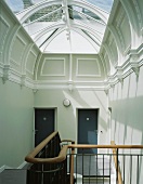 Staircase with modern glass roof in classical villa