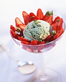 Pistachio ice cream with fresh strawberries