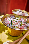 Rice noodle salad with chicken and radishes
