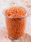 A glass of red lentils