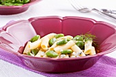 Penne pasta with broad beans and blue cheese