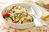 Pasta with courgettes, cherry tomatoes, herbs and Parmesan cheese