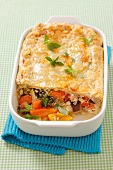 A vegetable quark bake with a puff pastry lid