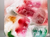 Colourful fruits in ice cubes