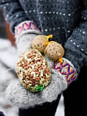 Person holding bird food