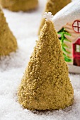 A Christmas tree-shaped nut biscuit