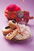 Various Christmas biscuits on a silver plate