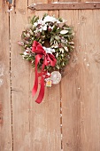 A Christmas wreath with a red bow