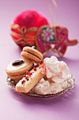 Various Christmas biscuits on a silver plate